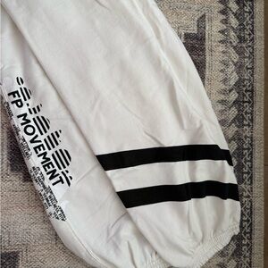 FP Movement by Free People White Joggers w/ Black Stripes size small never worn!